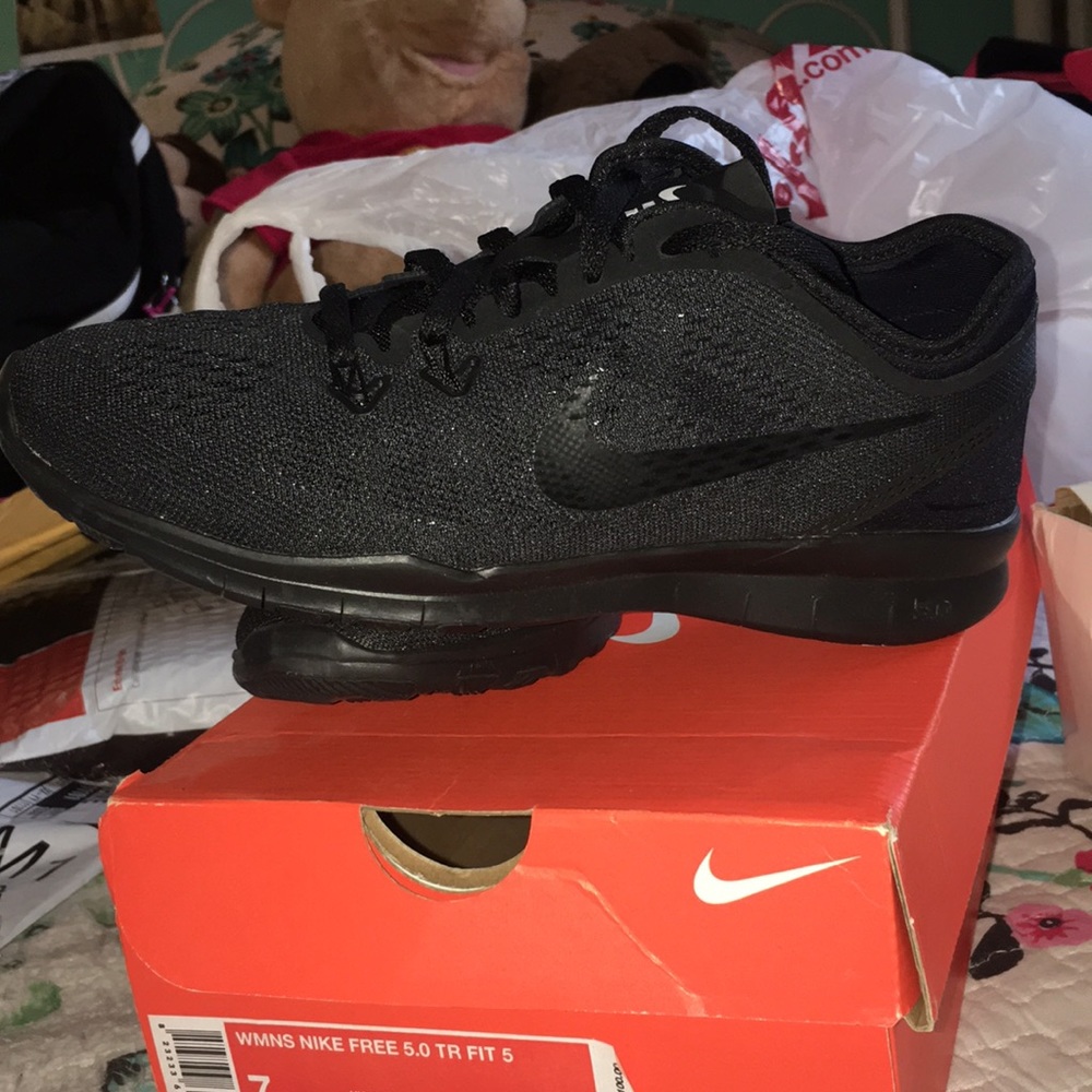 All black Nike sneakers